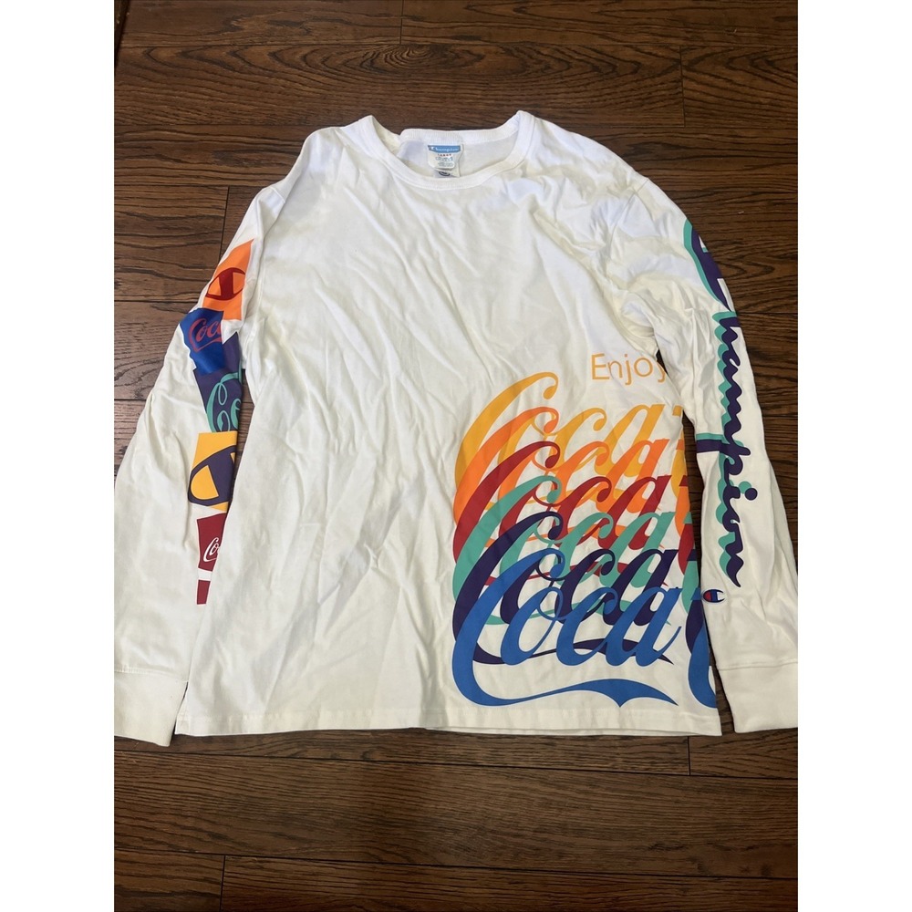 Champions Coca-Cola Long Sleeve Colorful Wrap Around Print Large Spell Outs NWOT